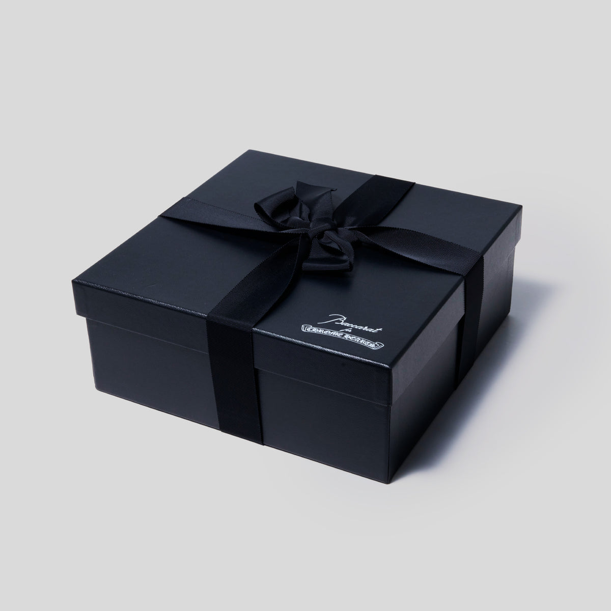 Chrome Hearts x Baccarat crystal ashtray styled with cigar