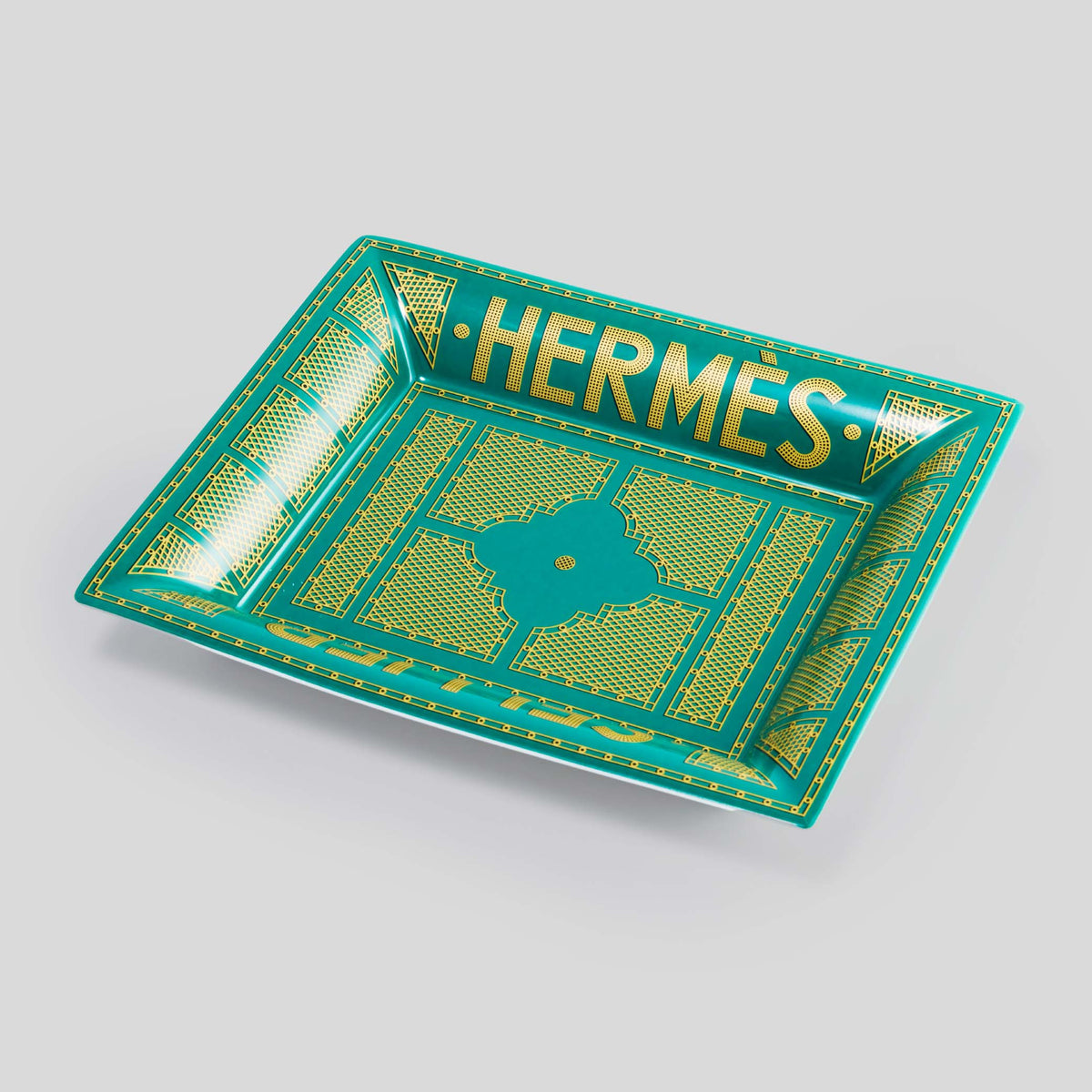 Hermès Sellier change tray — luxury lifestyle object iconic orange Hong Kong
