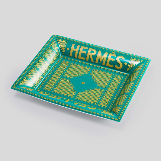 Hermès Sellier change tray — luxury lifestyle object iconic orange Hong Kong