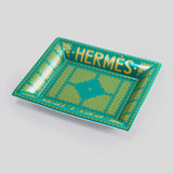 Hermès Sellier change tray — luxury lifestyle object iconic orange Hong Kong