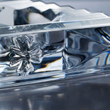 Close-up of Chrome Hearts cross motif on crystal ashtray base